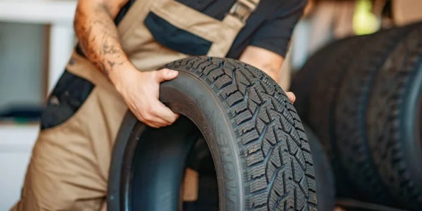 depositphotos_347434774-stock-photo-car-service-young-mechanic-in